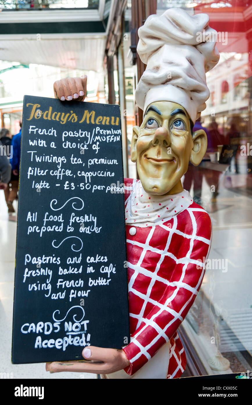A comic chef manequin advertising a menu for a café. Stock Photo