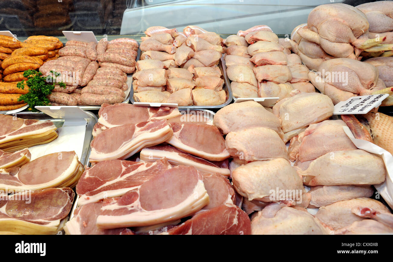 Meat for sale in a traditional butchers shop Stock Photo Alamy