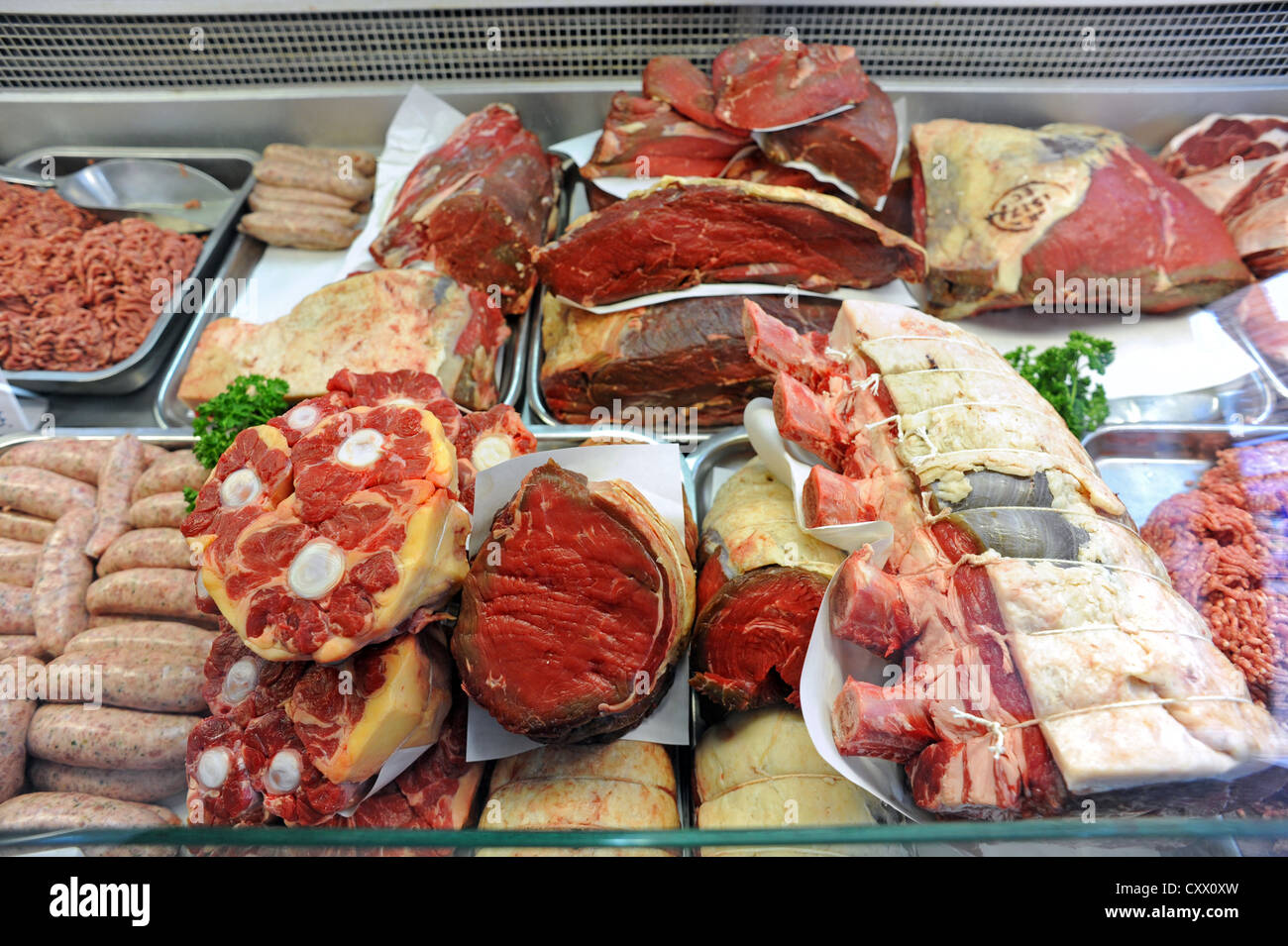 Meat for sale in a traditional butchers shop Stock Photo Alamy