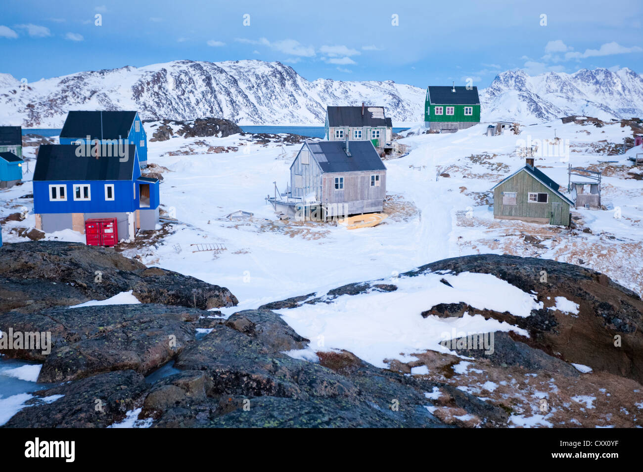 Winter scene with Inuit houses, Kulusuk village, Greenland Stock Photo