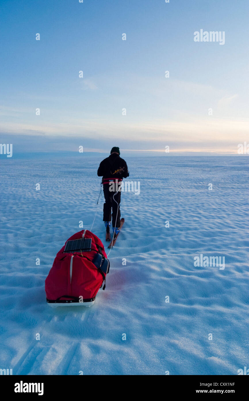 Scene of an explorer on expedition life on a polar journey west of Kulusuk, Greenland, Arctic Circle Stock Photo