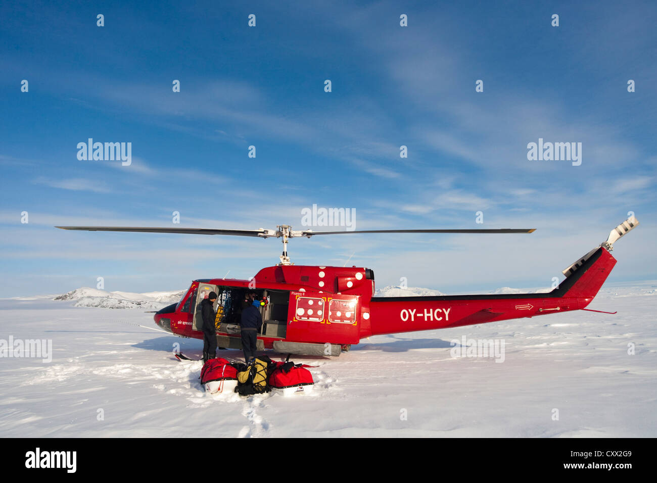 Helicopter on Inland Icecap, Greenland Stock Photo
