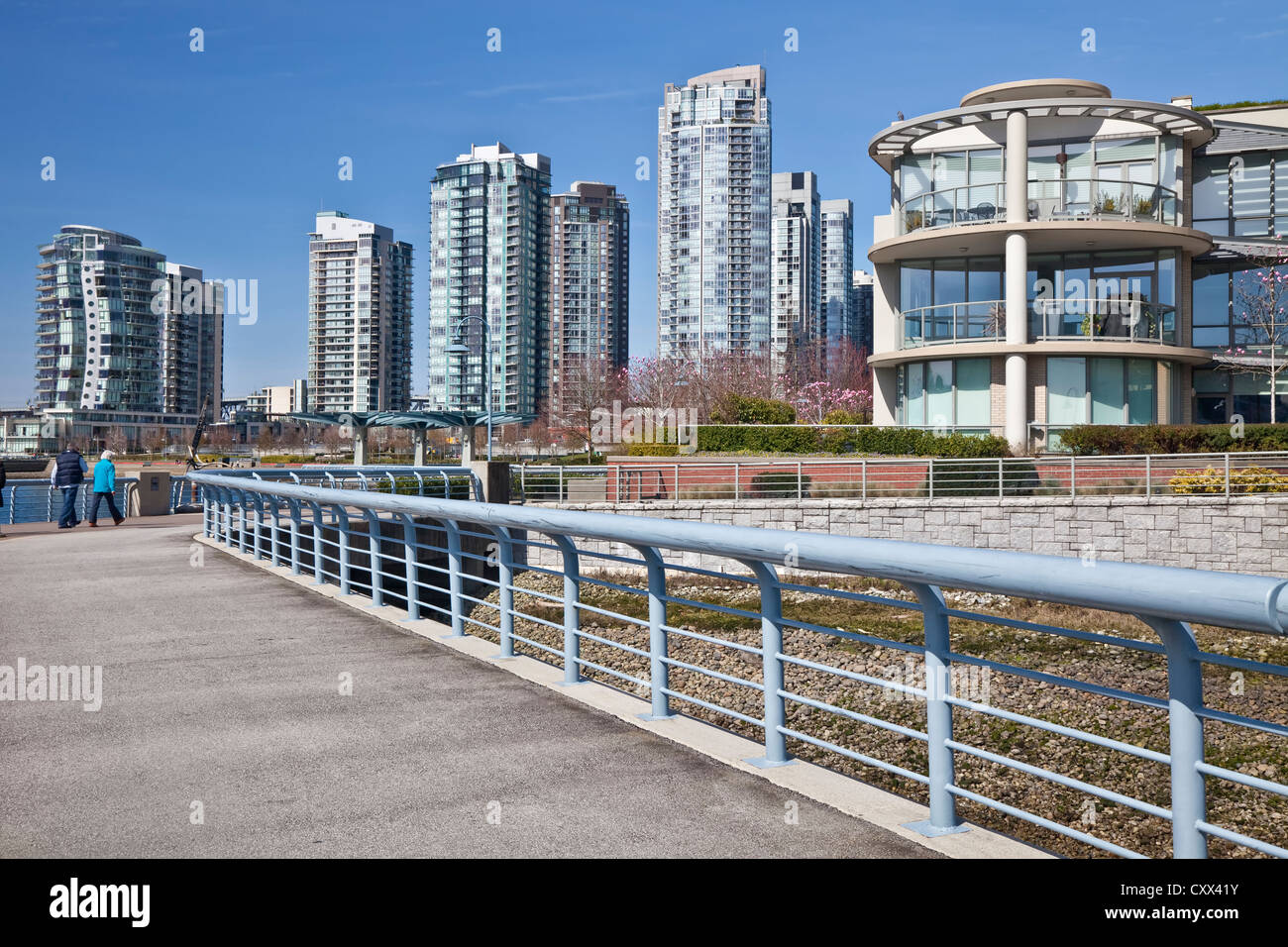 Pedestrian walkway along the waterfront in Vancouver, British Colombia, Canada. Stock Photo