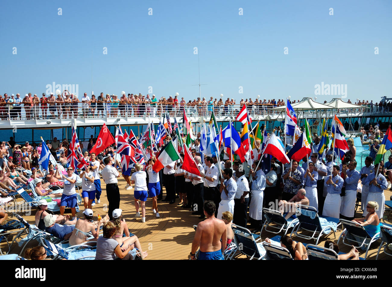 International staff procession on board Royal Caribbean 'Grandeur of the Seas' cruise ship, Adriatic Sea, Mediterranean, Europe Stock Photo