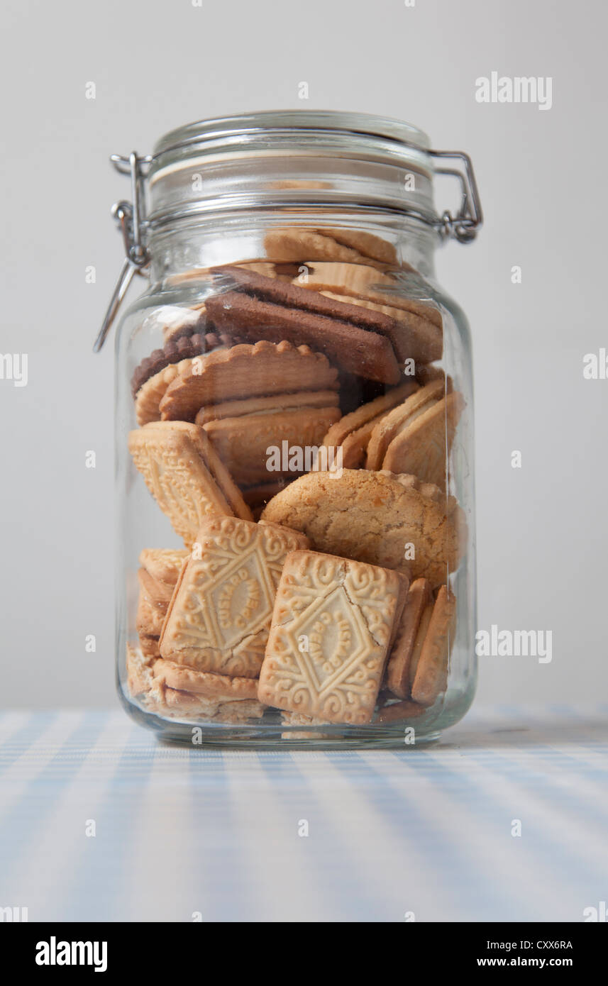 Cookie jar-jar filled with cookies and biscuits Stock Photo
