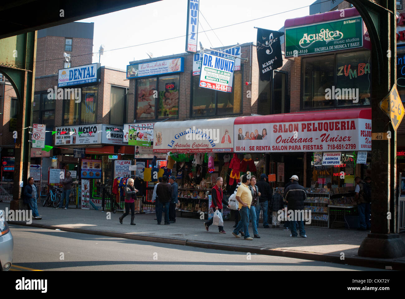 Businesses and restaurants along Roosevelt Avenue in the Jackson Heights neighborhood of Queens in New York Stock Photo