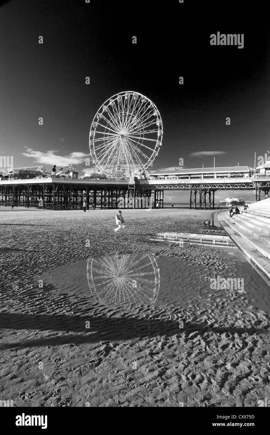 a black and white photo of the big wheel north pier, blackpool Stock Photo