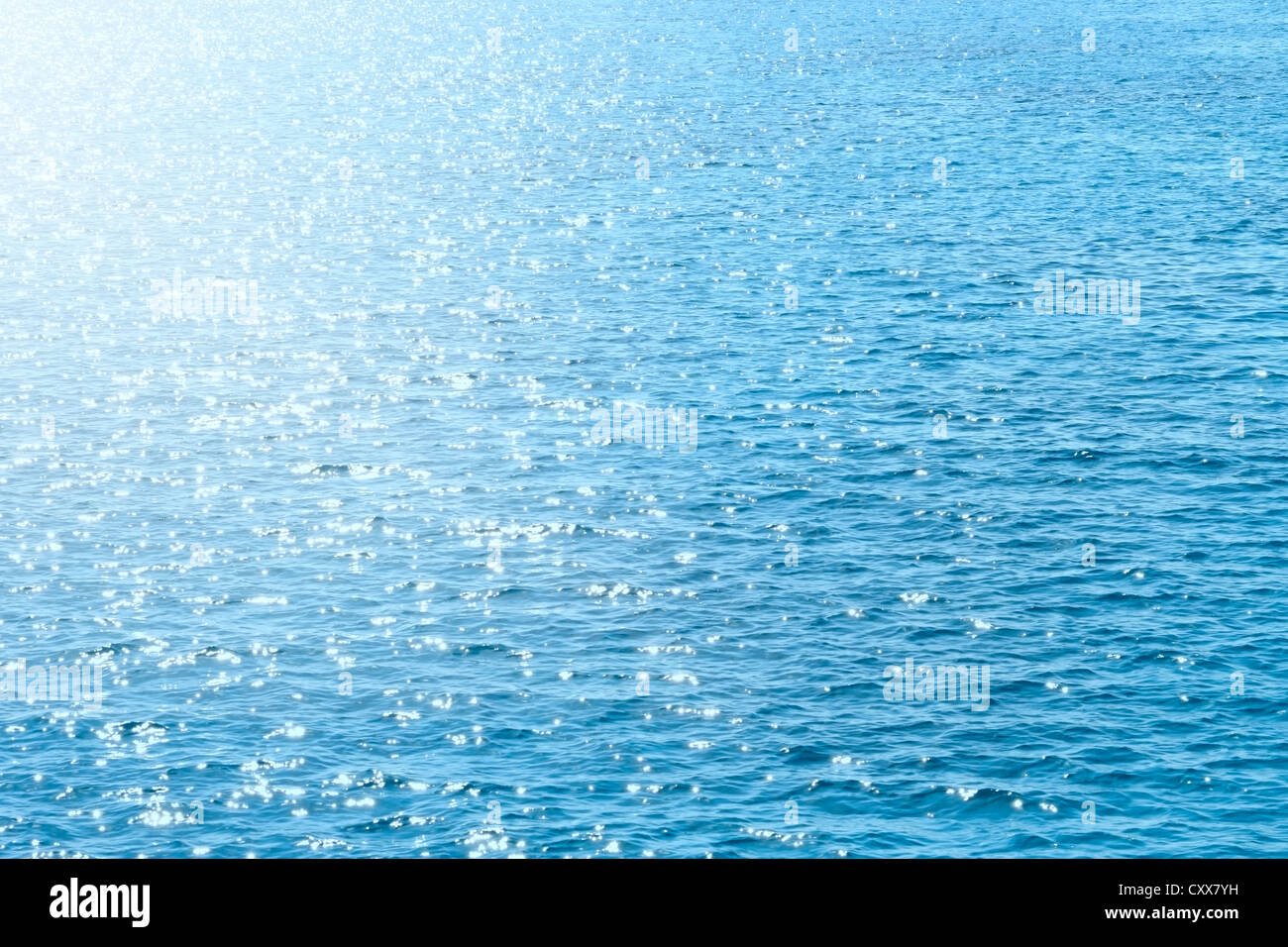 Reflection of sunlight on the blue surface of the sea Stock Photo - Alamy
