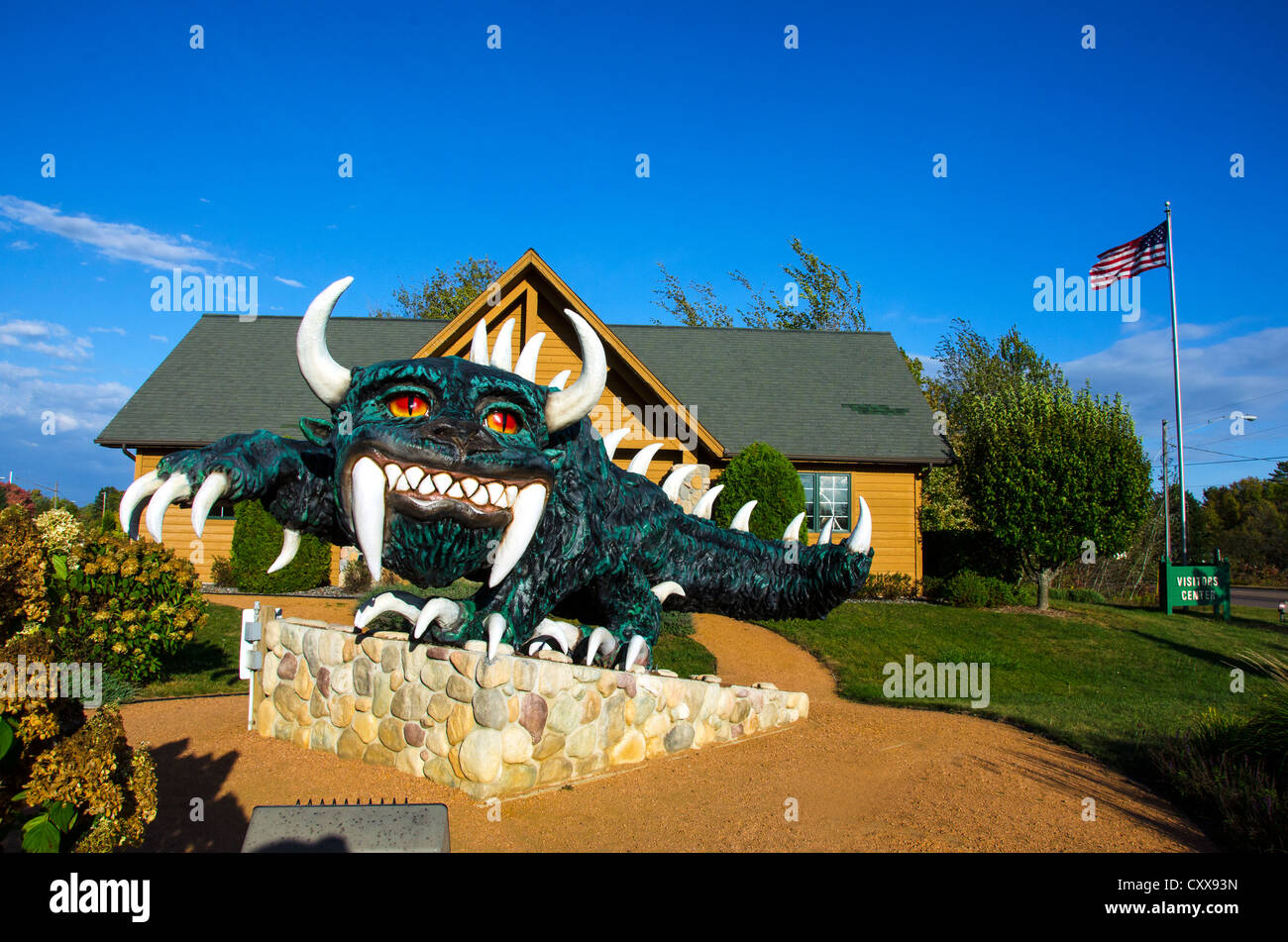 A statue of the Hodag, a mythical creature, in front of the Chamber of Commerce building in  Rhinelander, Wisconsin Stock Photo