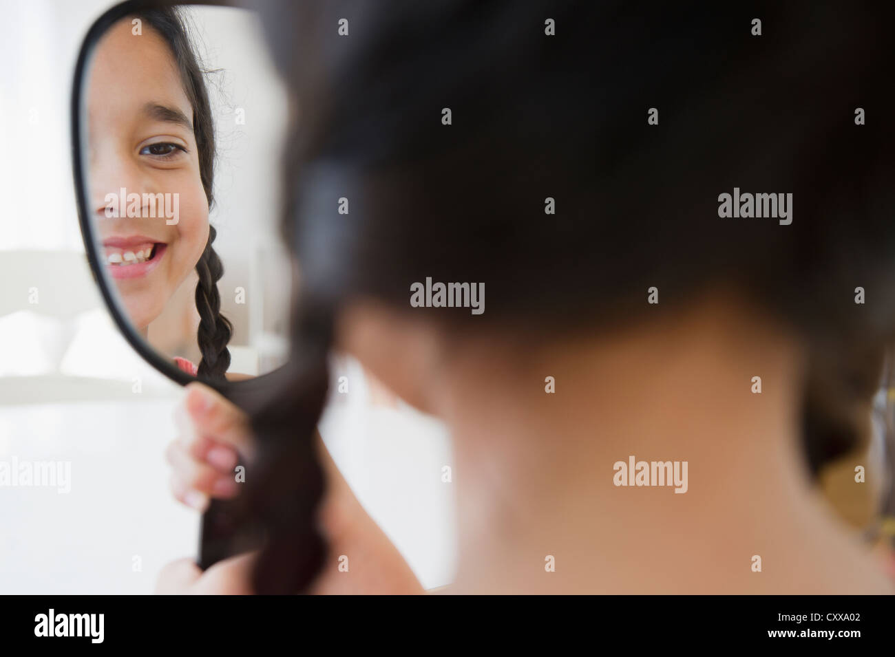 Mixed Race Girl Looking In Mirror Stock Photo Alamy Mixed Race Girl Looking In Mirror Stock Photo Alamy