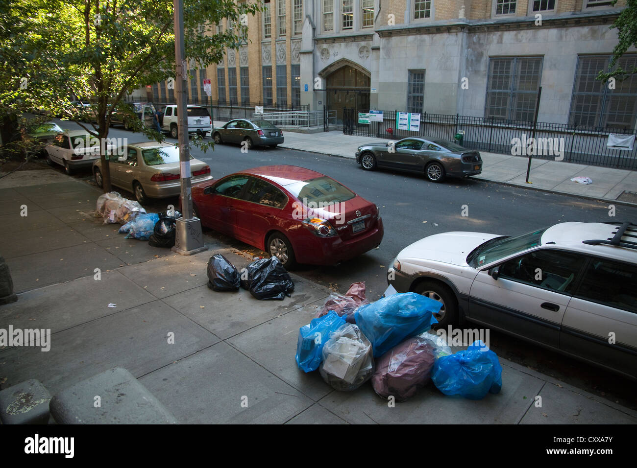 Trash awaiting pick up Brooklyn, New York USA Stock Photo