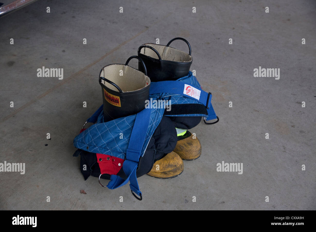 Firefighter turn-out gear, boots and pants Eastern USA Stock Photo