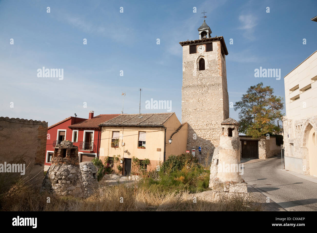 Torre del Reloj in Peñafiel with typical wine cellar chimneys - Peñafiel, Valladolid Province, Castile and León, Spain Stock Photo
