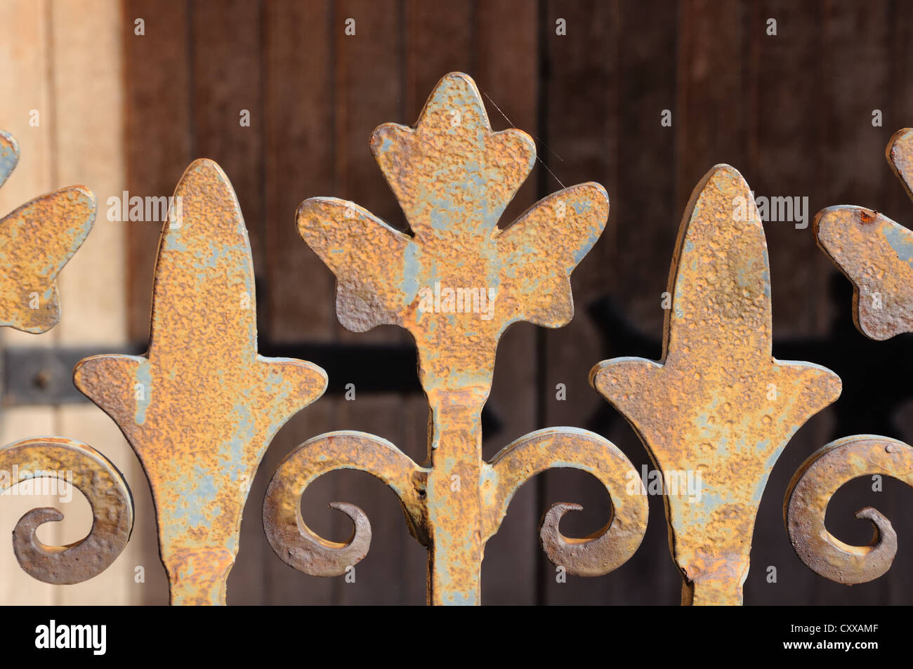 Rustic and rusty decorative church fence Stock Photo