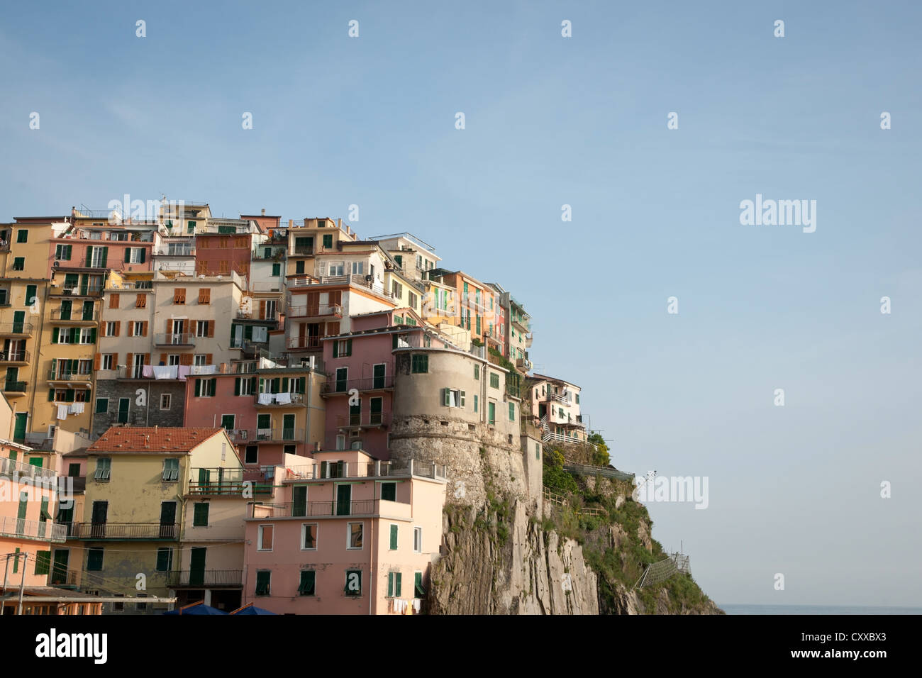 Riomaggiore, Italian coastal town built on cliff-tops of the Cinque Terre area. Stock Photo