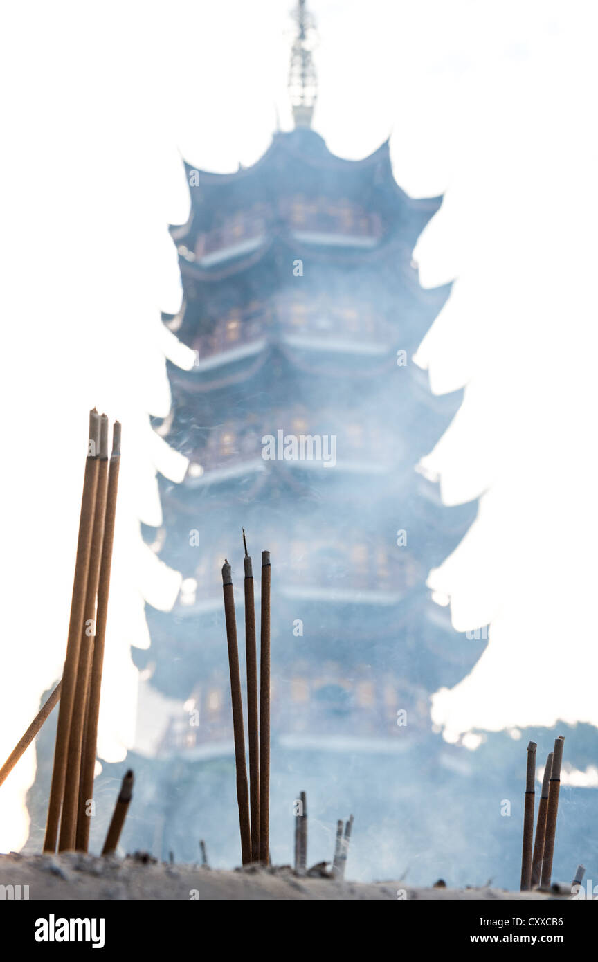 Nanjing, China. Incense burning at the Gujiming Si temple. Stock Photo