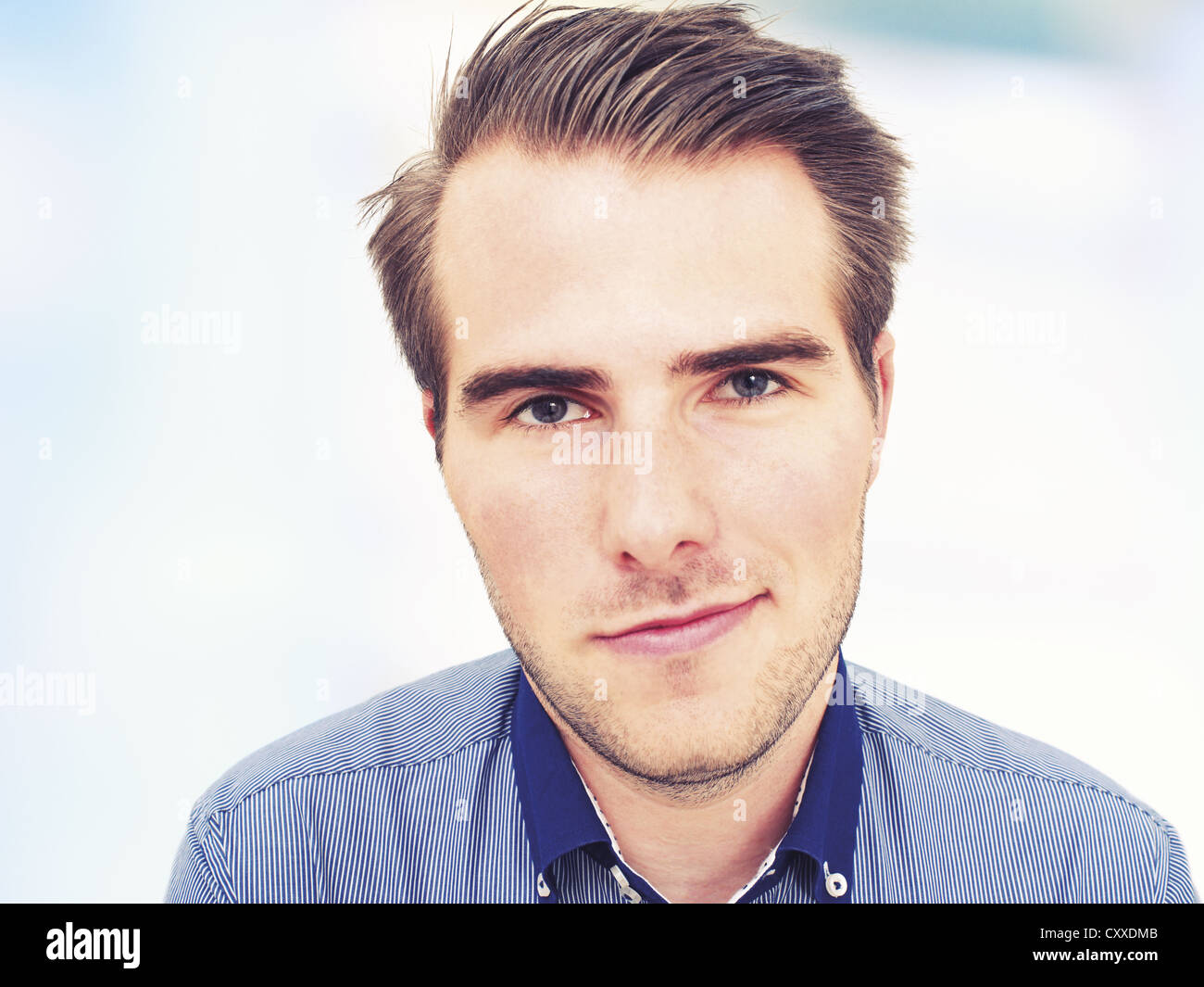 Young man, portrait, sly glance Stock Photo