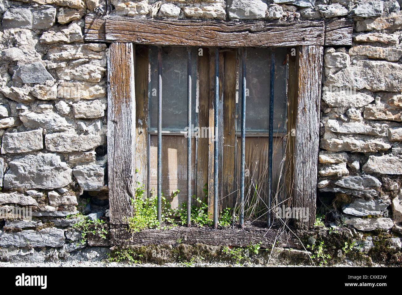 Old window in an rustic stony wall Stock Photo - Alamy