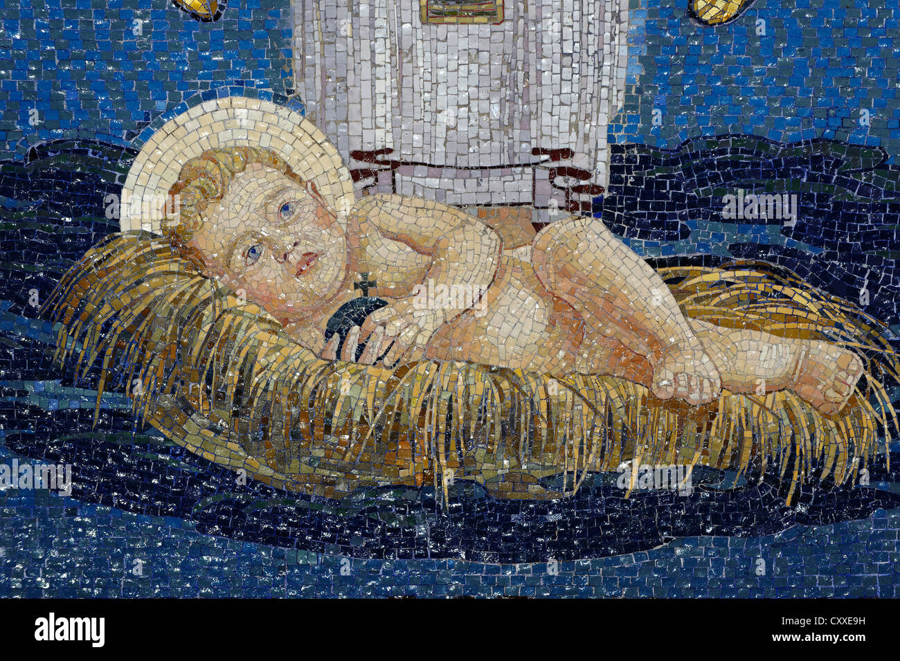 Baby Jesus lying in the manger, Christmas, wall mosaic at the Church of the Transfiguration, Mount Tabor, Galilee, Israel Stock Photo