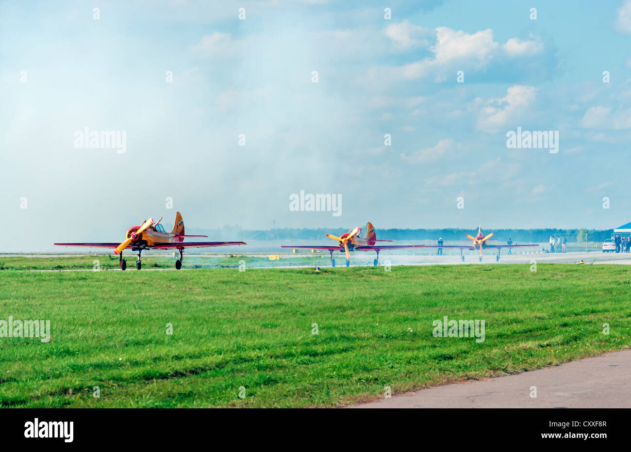 Aerobatic team on airplane Yak-52 on airshow AVIASVIT-XXI. Stock Photo