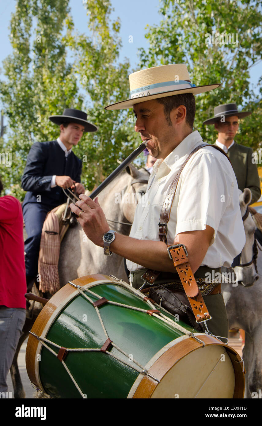 Flute player and drummer in traditional spanish costume during annual