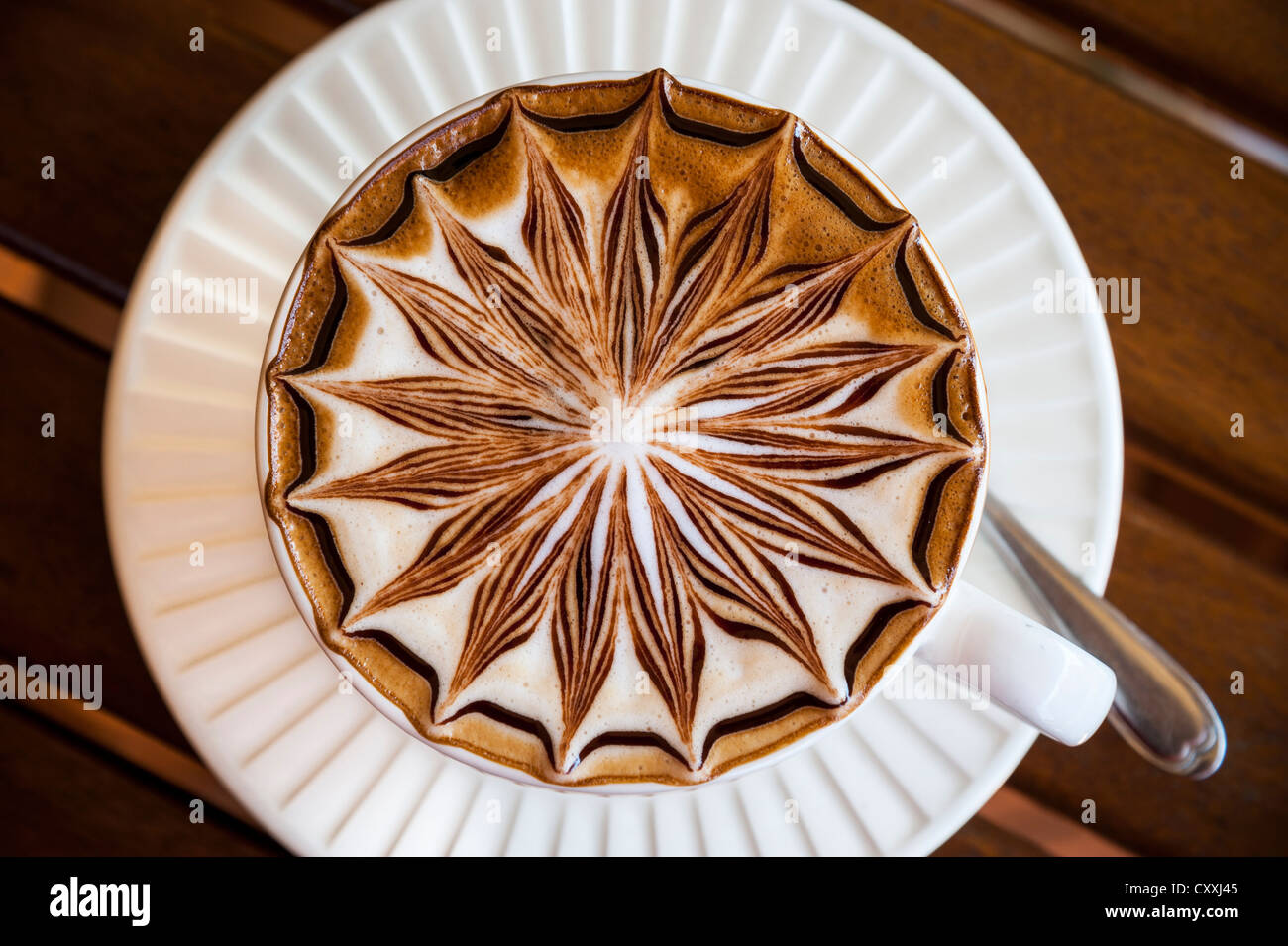 Artistically decorated cappuccino, cup from above Stock Photo