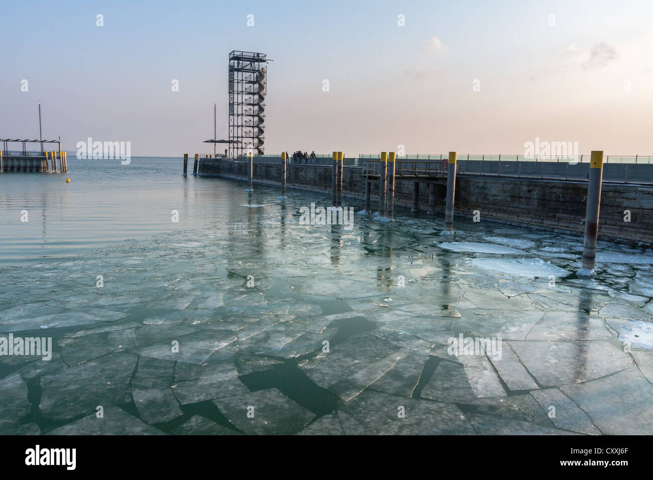 Port basin with ice floes in the evening light, Friedrichshafen on Lake Constance, Bodenseekreis district, Baden-Wuerttemberg Stock Photo