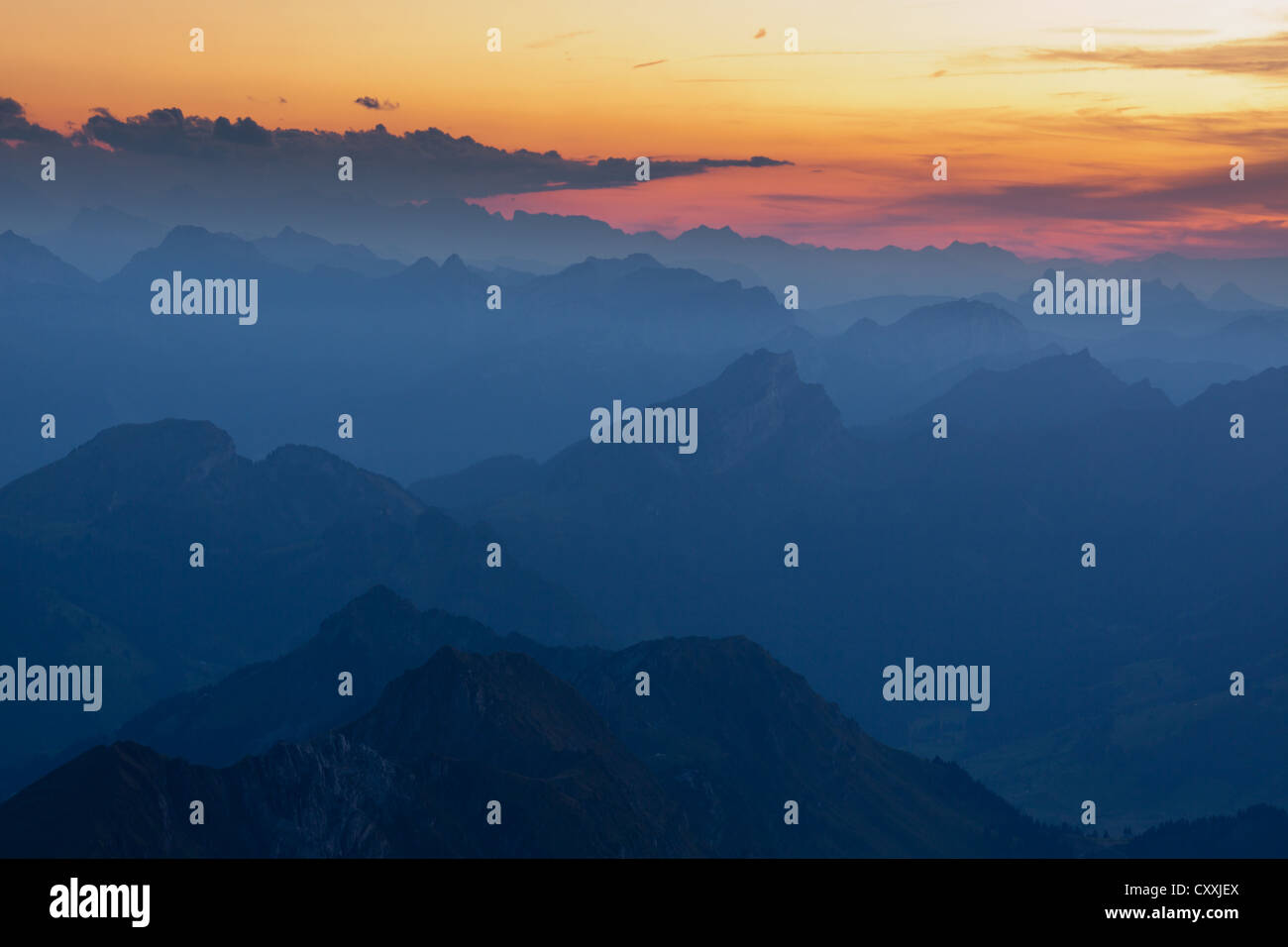 Mountain peaks with different shades seen from the summit of Santis