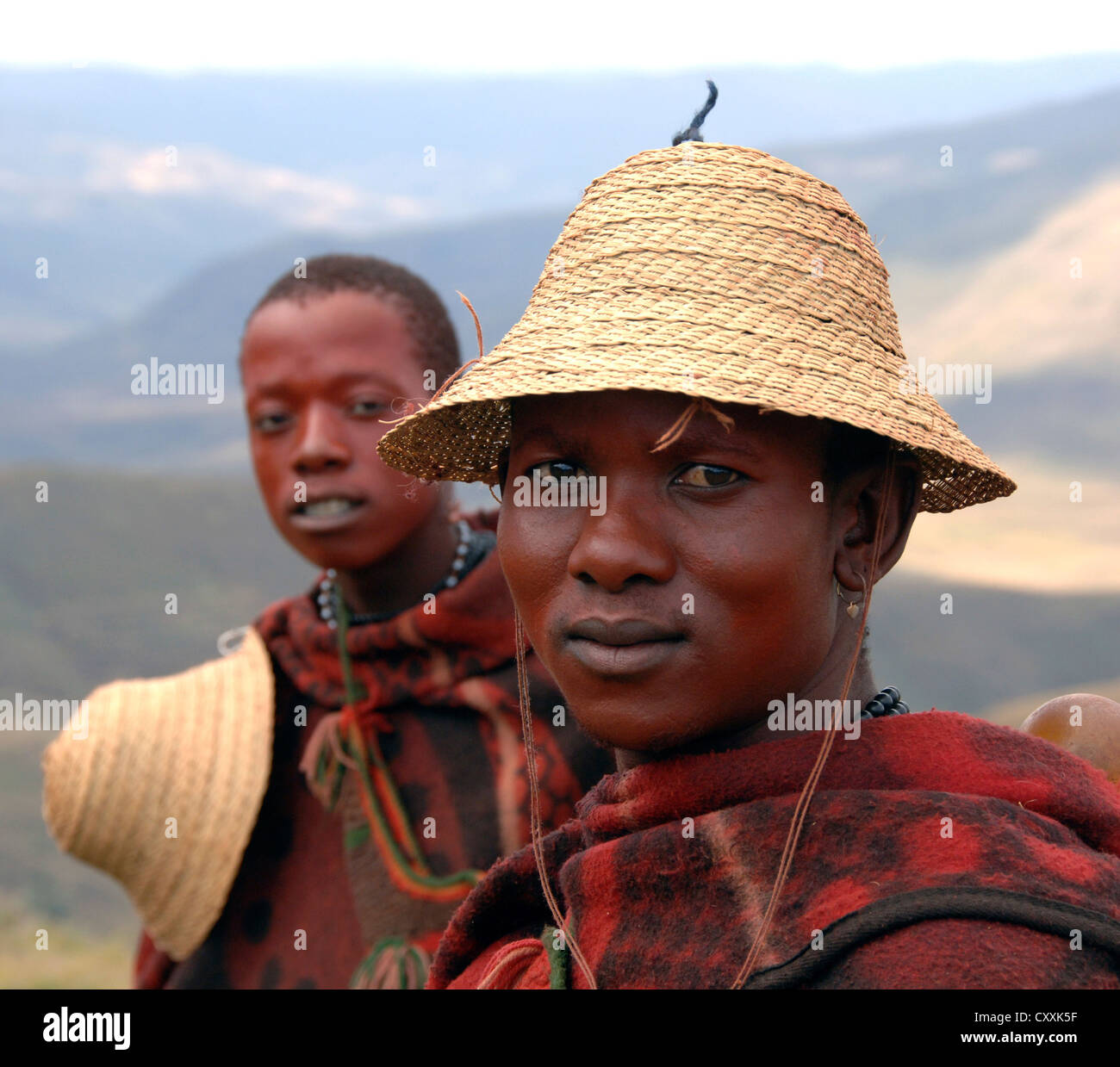 Group of young Basotho men wearing traditional Basotho blankets in