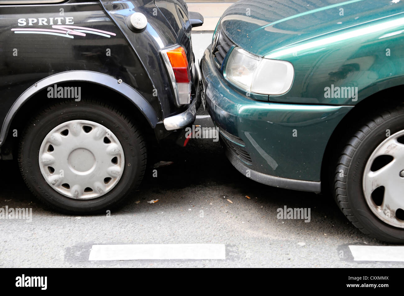 Closely parked cars, shortage of car parks, Paris, France, Europe Stock Photo