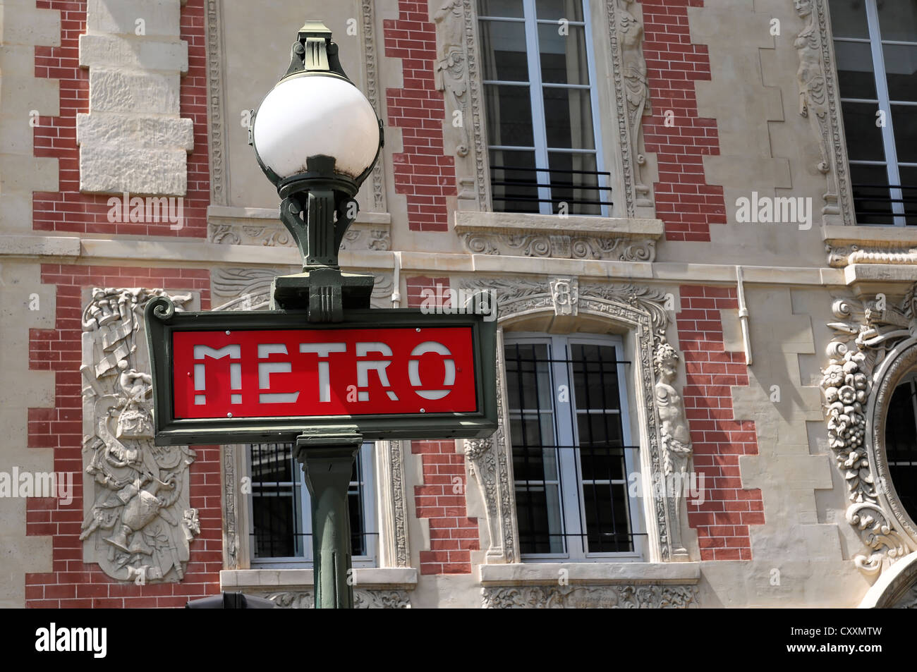Art Nouveau sign with a lamp, Metro, Paris, France, Europe Stock Photo