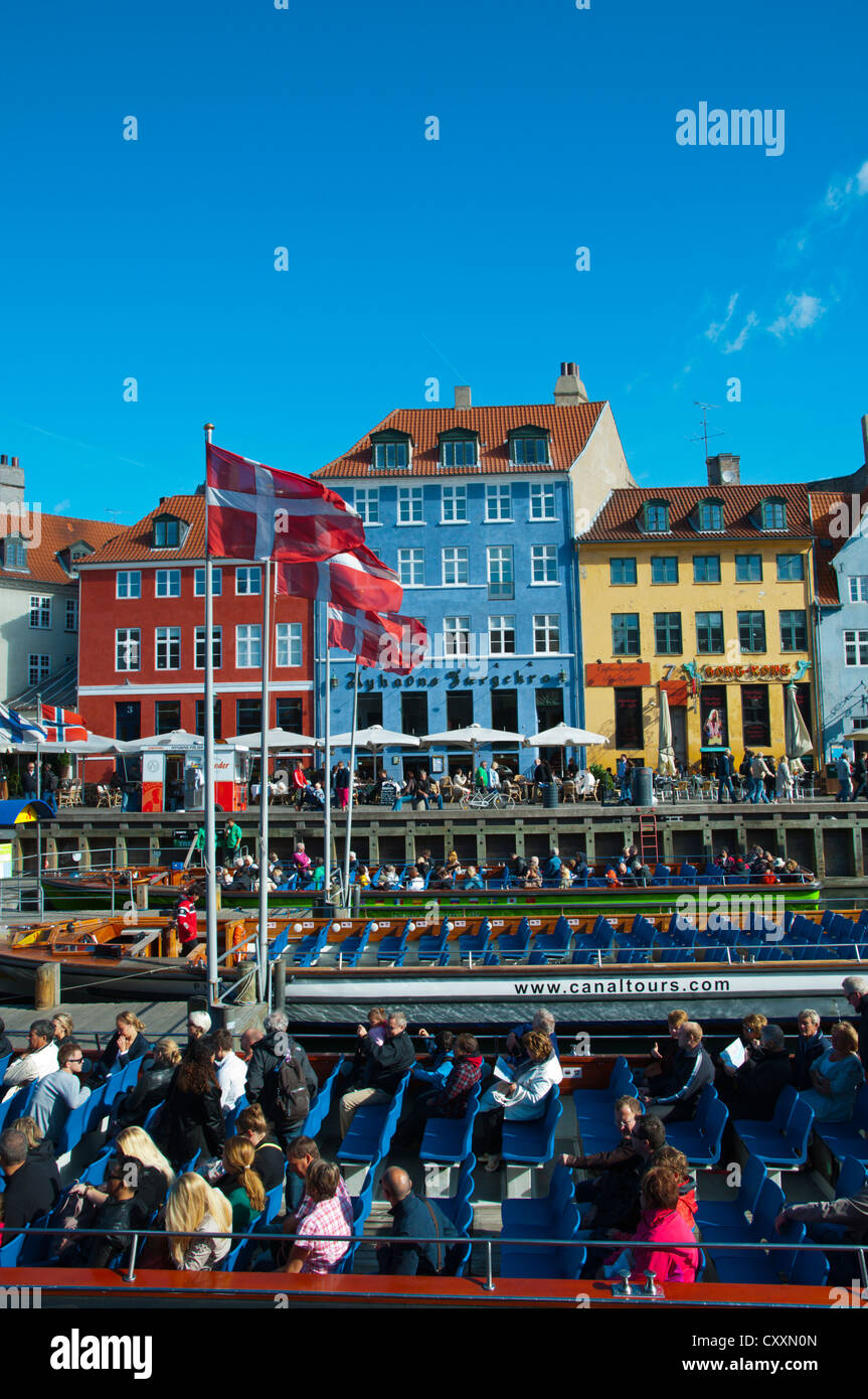 Sightseeing cruise tour boat Nyhavn harbour central Copenhagen Denmark Europe Stock Photo
