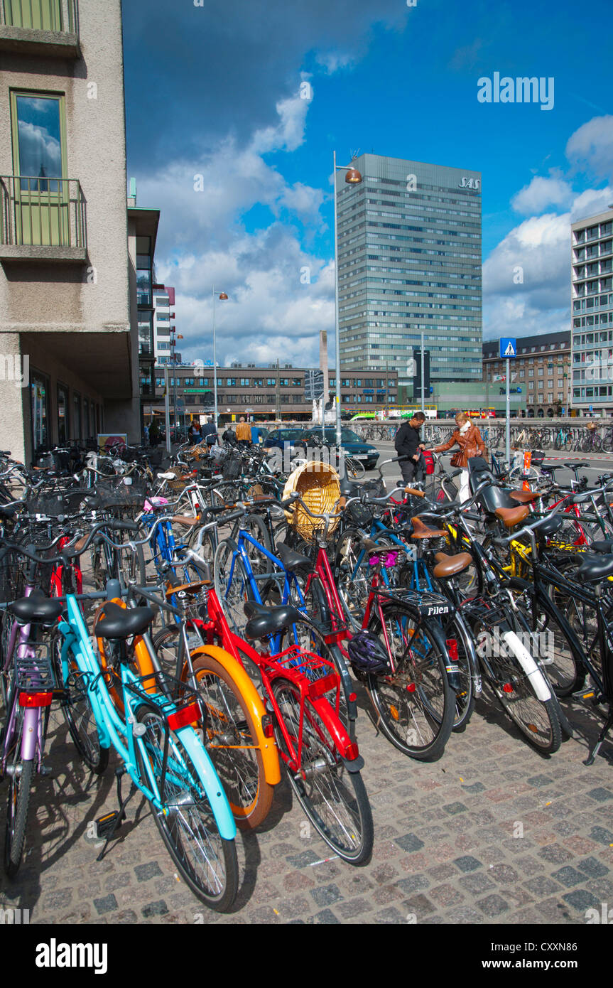 Bicycles parked at Banegårdpladsen square outside central railway station Copenhagen Denmark Europe Stock Photo