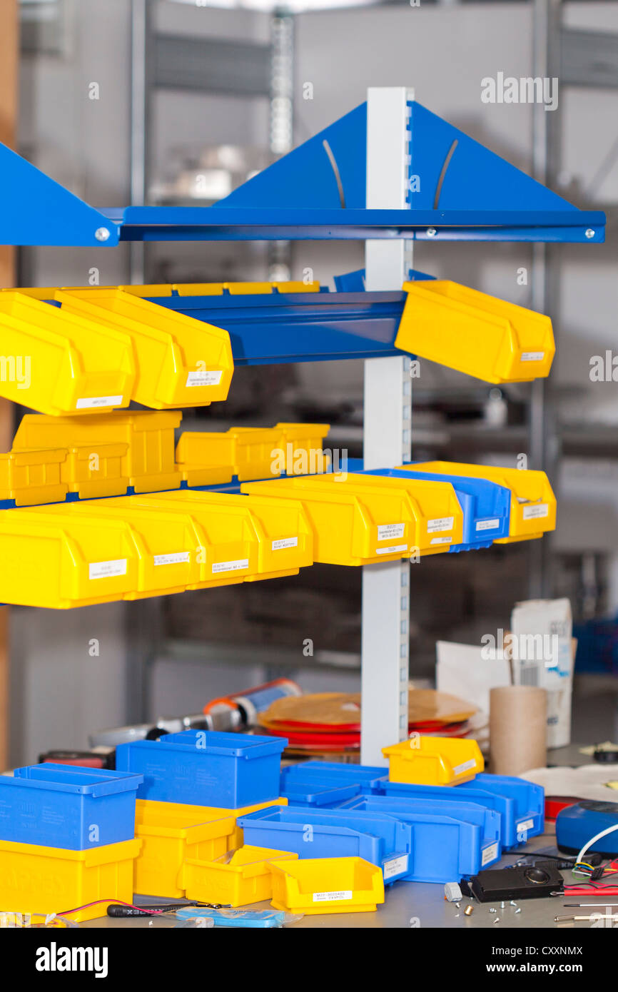Workbench with small storage boxes, detailed view Stock Photo
