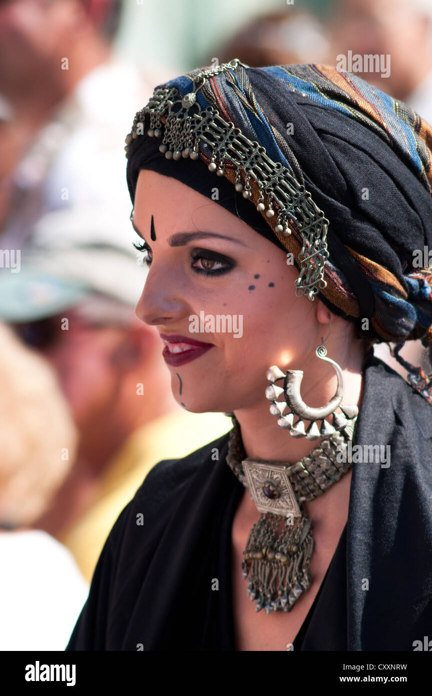 Tallinn, Estonia - July 10, 2010: young woman with attractive make-up performing as a part of oriental dance group Stock Photo