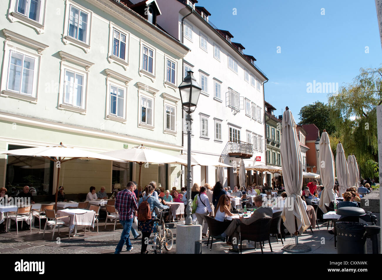 Restaurant on the riverfront Cankarjevo Nabrezje, Ljubljana, Slovenia Stock Photo