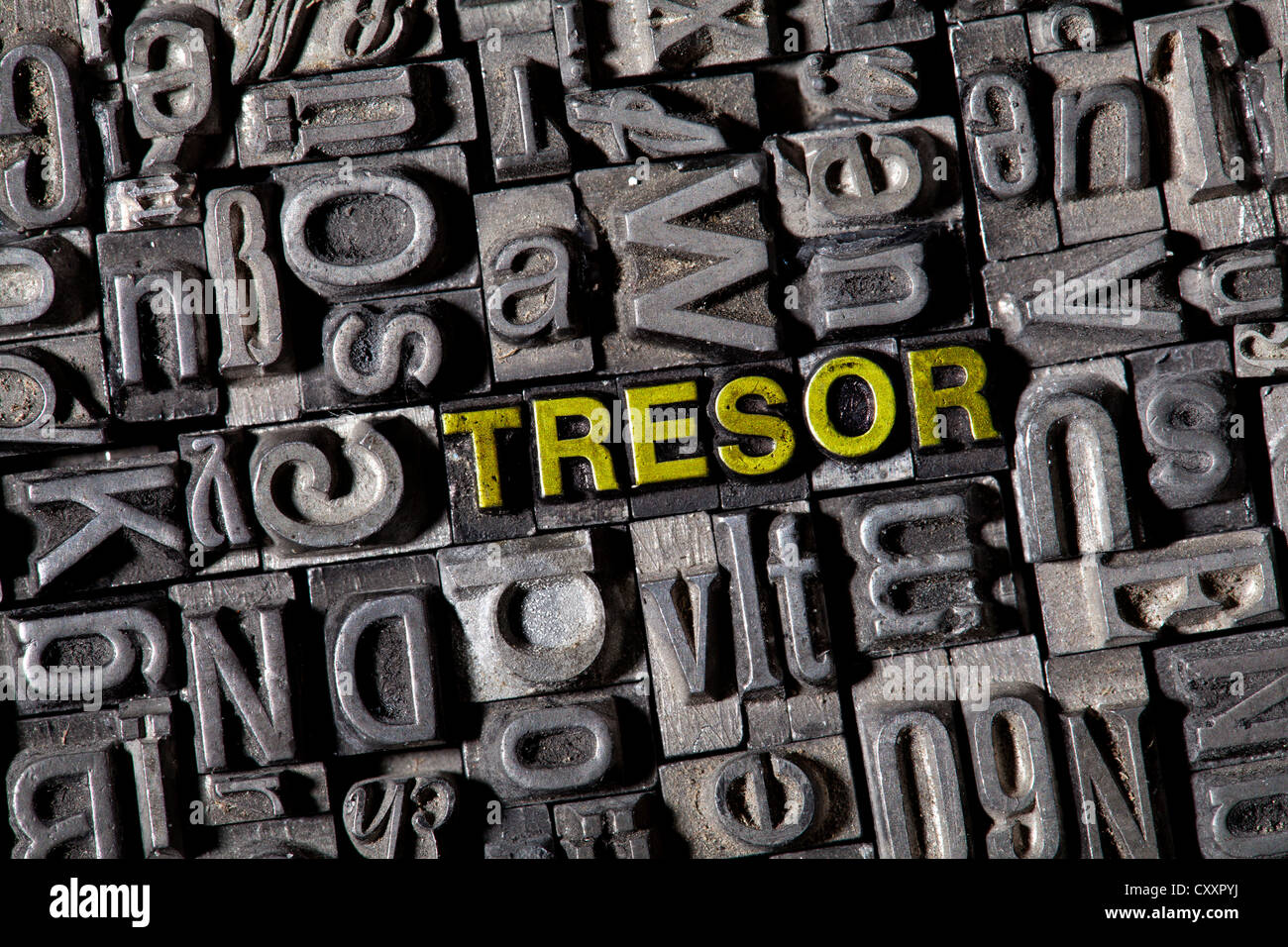 Old lead letters spelling the word 'Tresor', German for safe Stock Photo