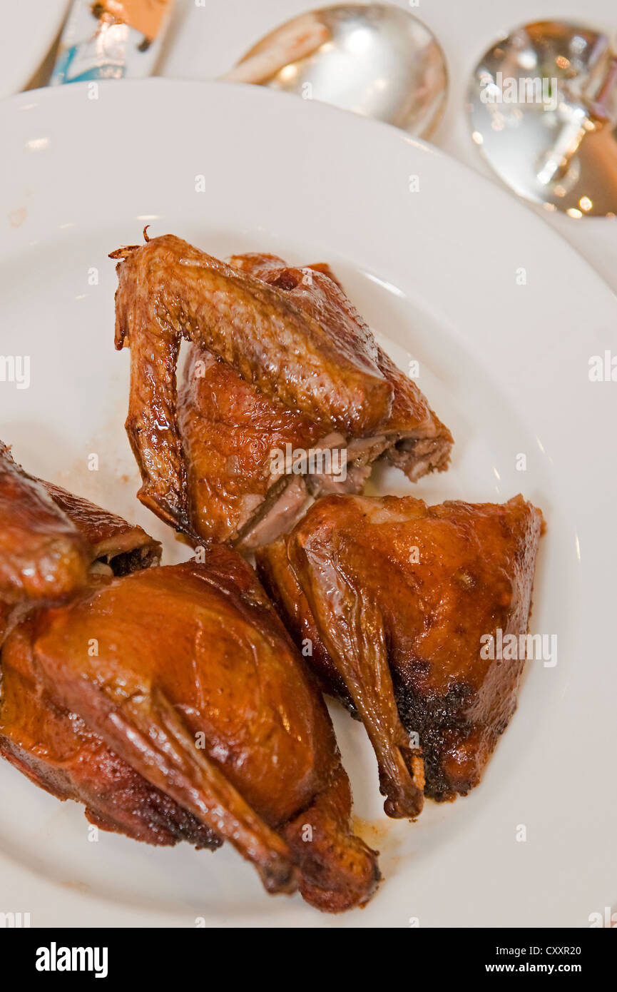 Roasted Duck cut in quarters Stock Photo Alamy