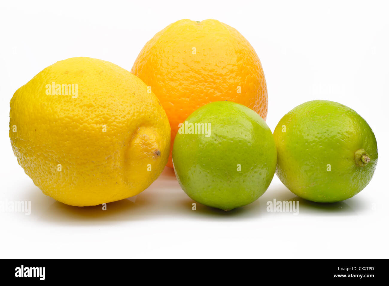 Lime, lemon and orange close up on a white background Stock Photo - Alamy