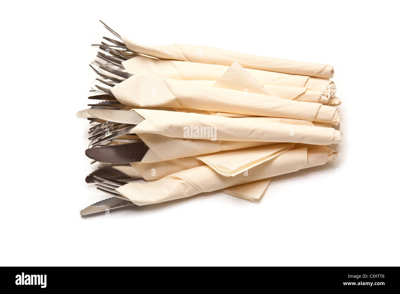 Cutlery wrapped in napkins isolated on a white studio background Stock