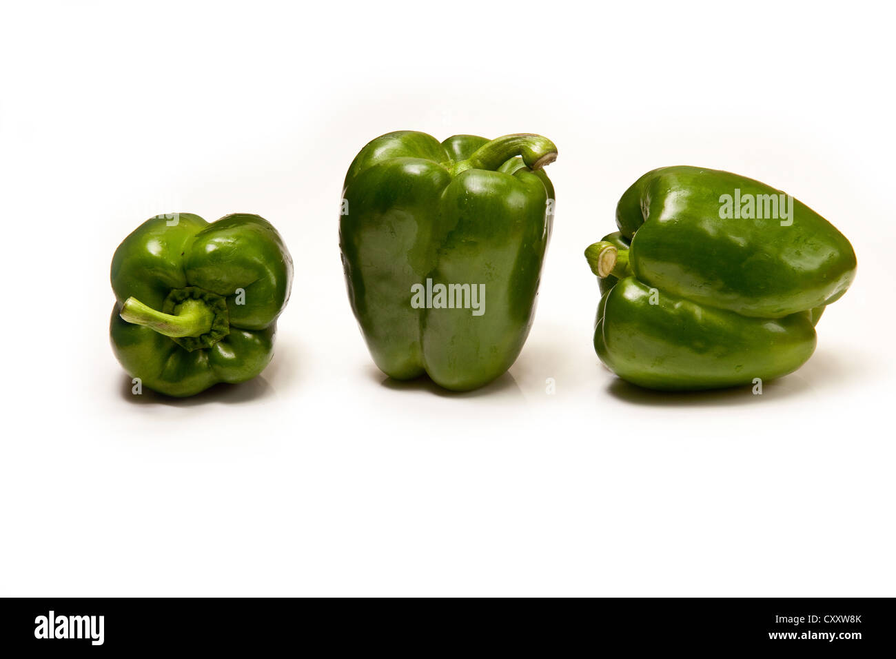 Green bell peppers isolated on a white studio background Stock Photo