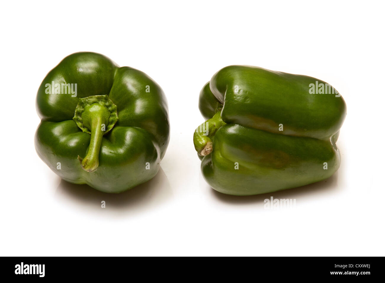 Green bell peppers isolated on a white studio background Stock Photo Alamy