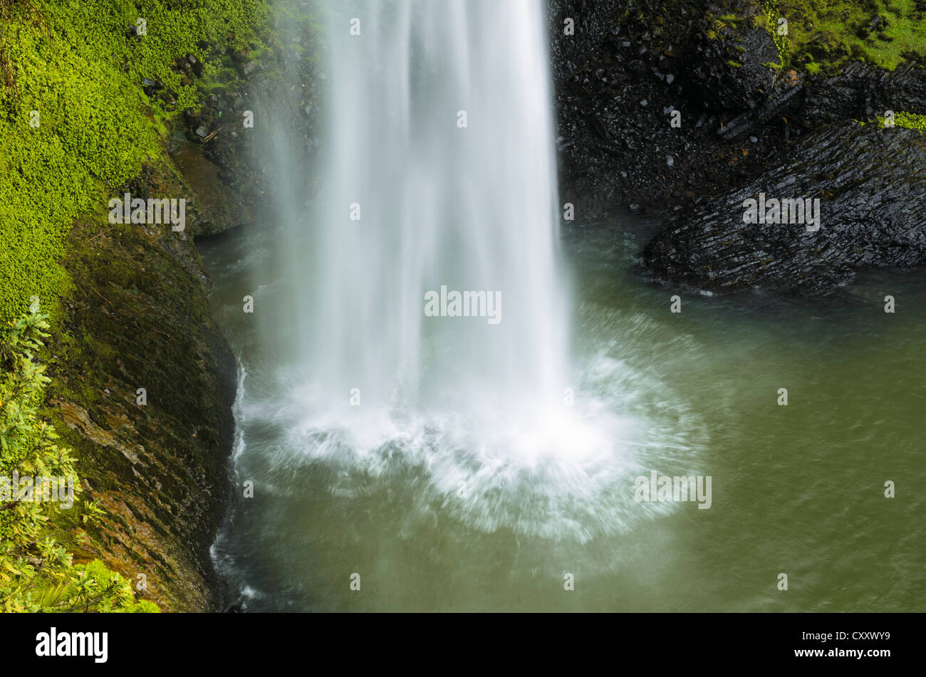 Surge of water falling into a lake, Bridal Veil Falls, Raglan, Waikato