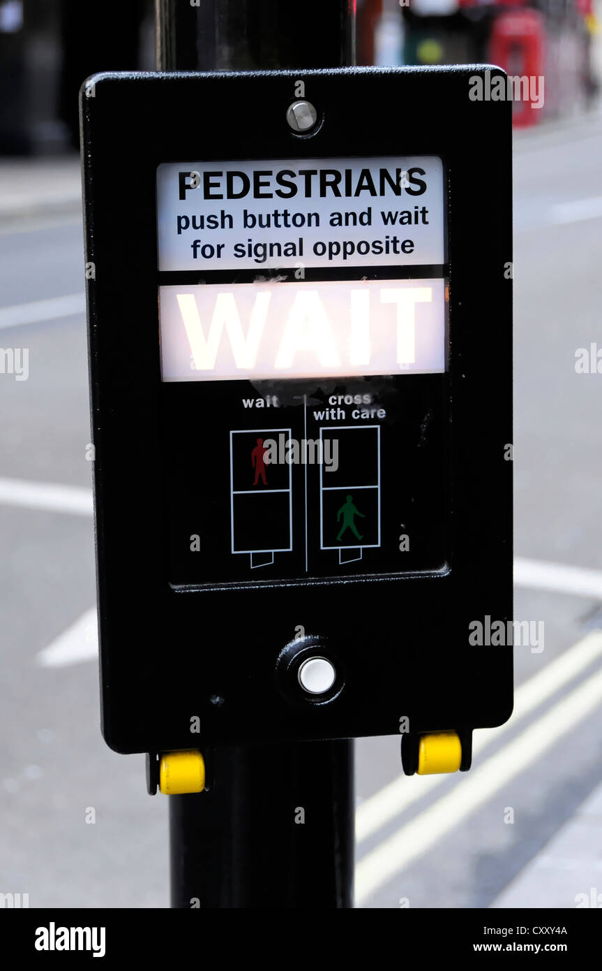 Pedestrian lights, instructions on a pedestrian crossing in London, England, United Kingdom, Europe Stock Photo