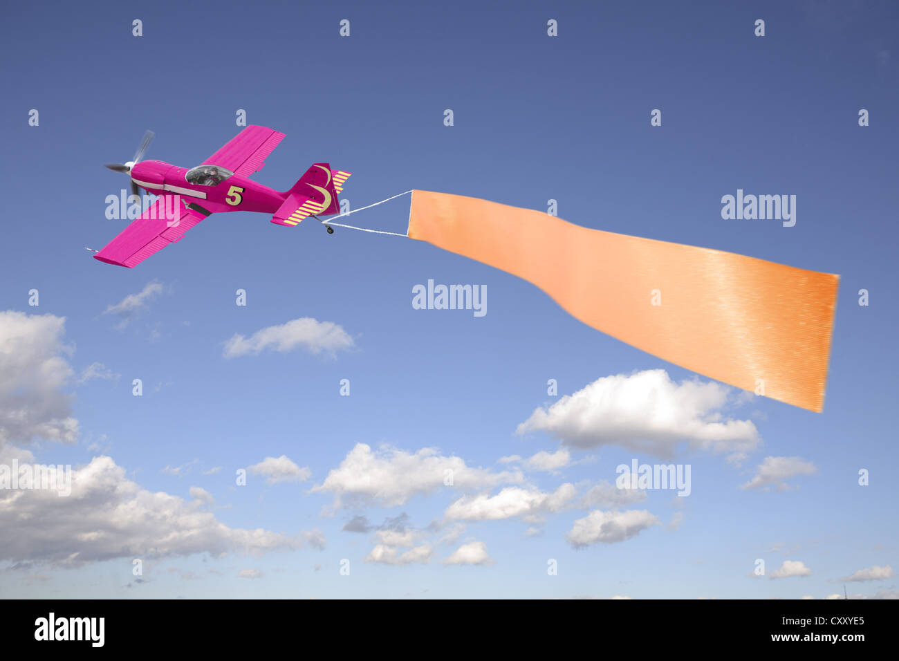 Plane pulling a blank banner in the sky, illustration Stock Photo