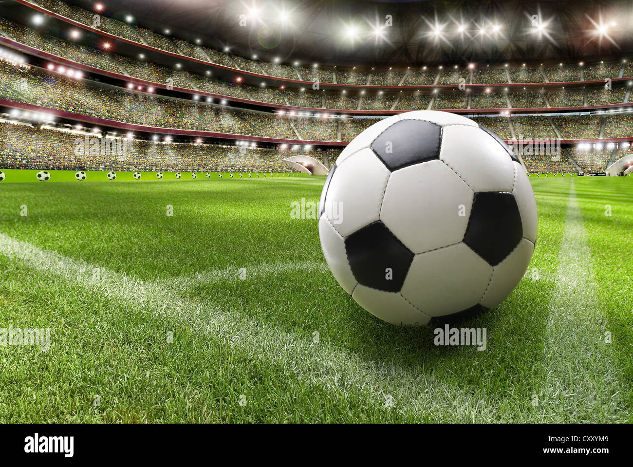 Soccer ball, soccer stadium, lawn, grand stand Stock Photo