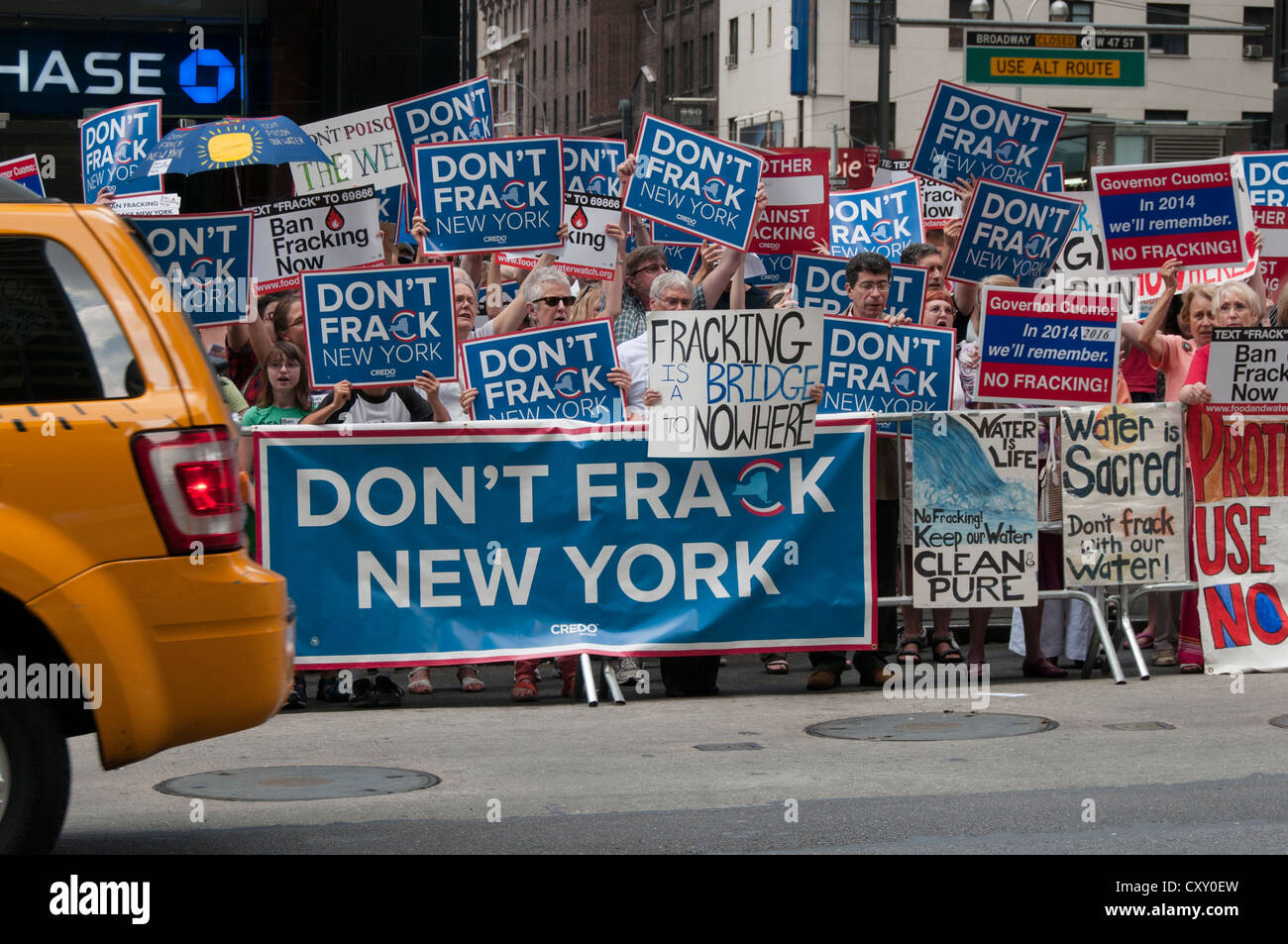 Activists demonstrate in a Manhattan protest against fracking for natural gas in New York outside NY Governor Cuomo's hotel. Stock Photo