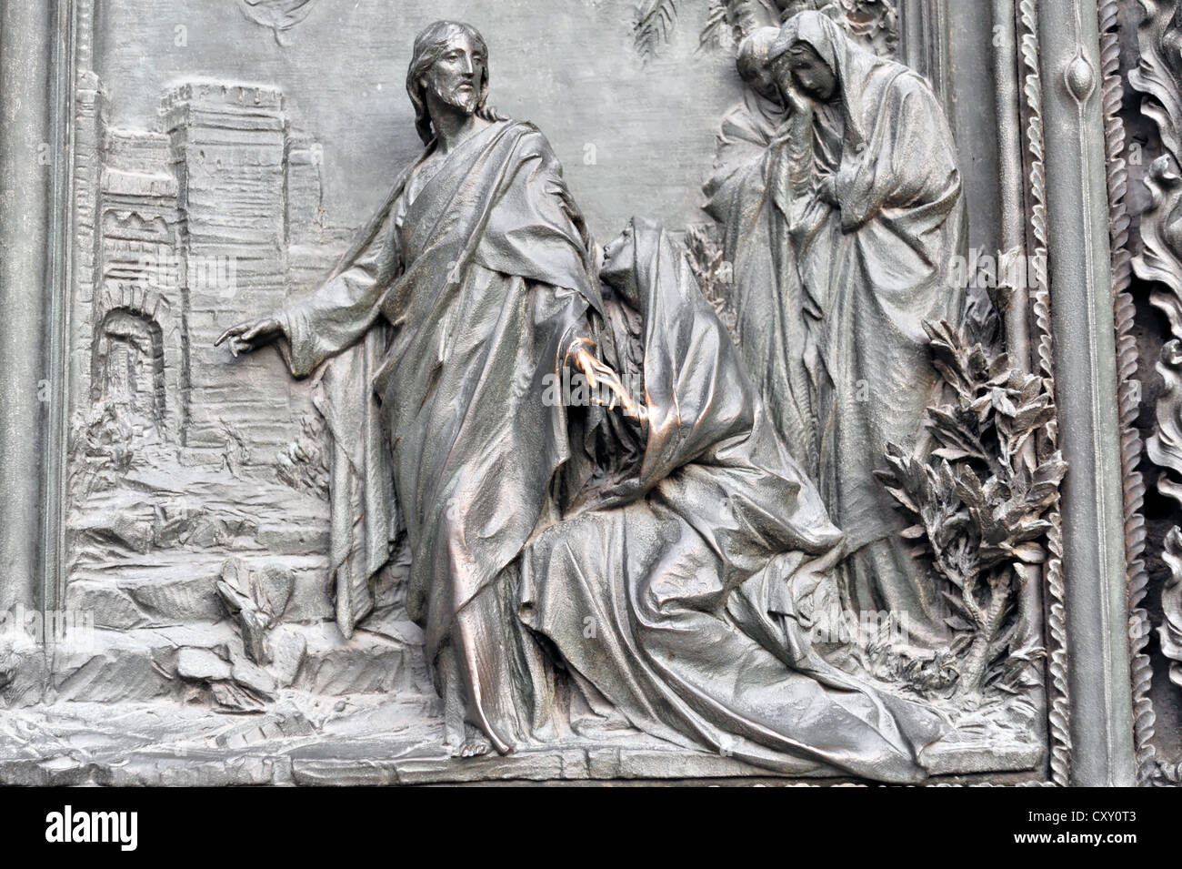 Door decoration in the entrance area, Christian art, Milan Cathedral, Duomo di Milano cathedral, start of construction in 1386 Stock Photo