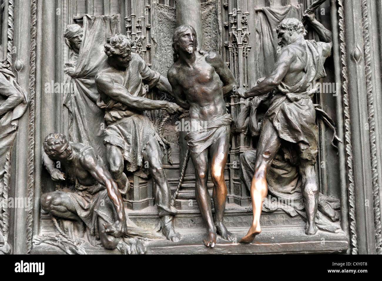 Door decoration in the entrance area, Christian art, Milan Cathedral, Duomo di Milano cathedral, start of construction in 1386 Stock Photo