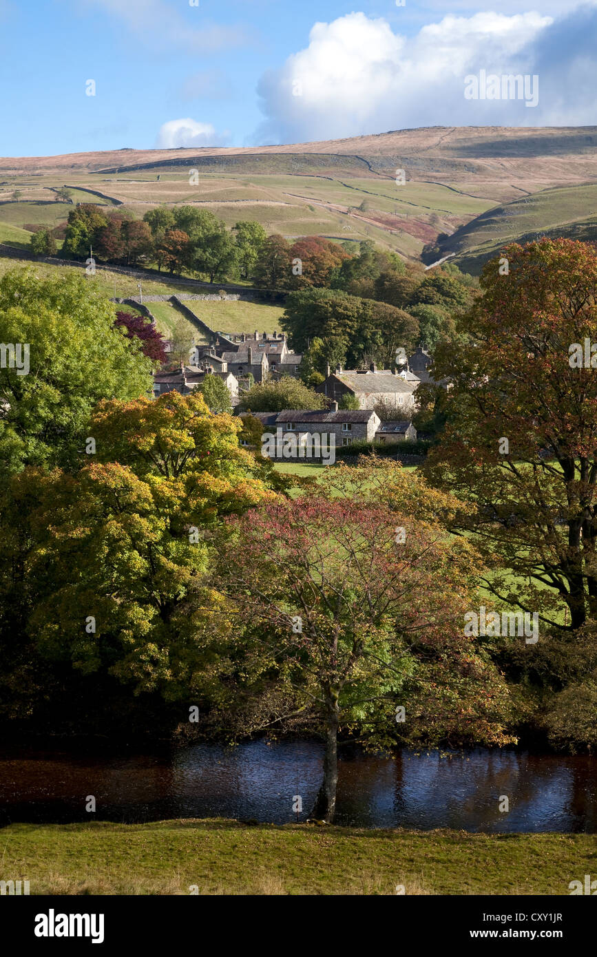 Langwith Fell  Autumn trees and the Village of Kettlewell near Skipton, North Yorkshire Dales, UK Stock Photo